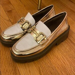 Women’s gold platform buckle loafers